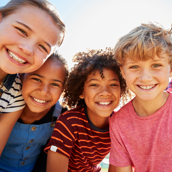 Children Smiling Outdoors